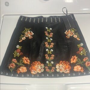Signature8 Black Leather Skirt with Floral Embroidery Metal Embellishment